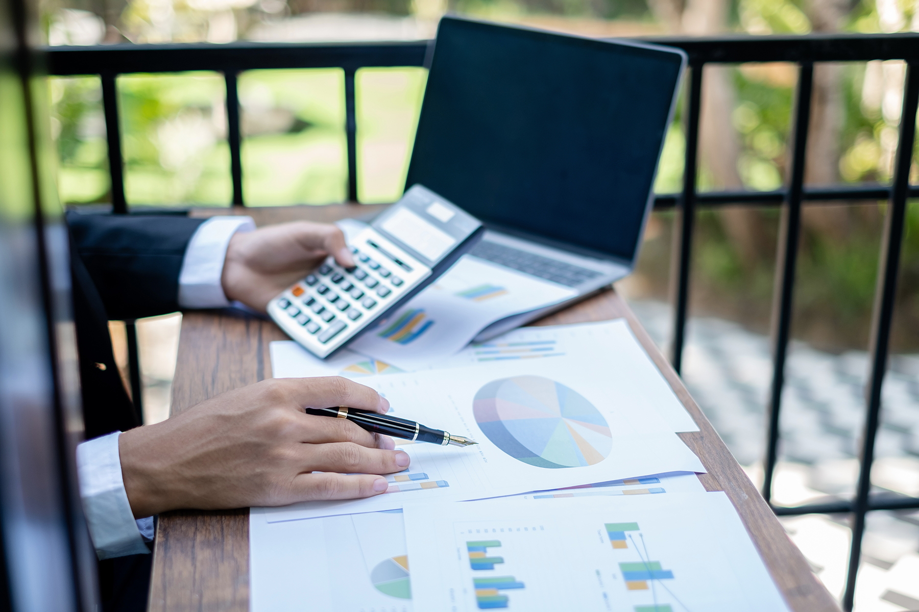 young businessman financial market analyst sits at 2025 photo